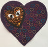A Sequin Changing Heart w/Eyes in a Heart